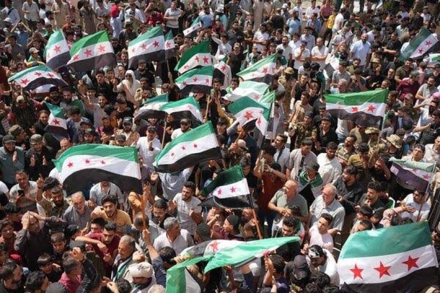 YULETIDE: PROTESTS ERUPT IN SYRIA OVER DESTRUCTION OF CHRISTMAS TREE 